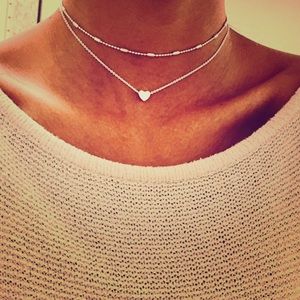 Silver plated heart shaped bib chocker